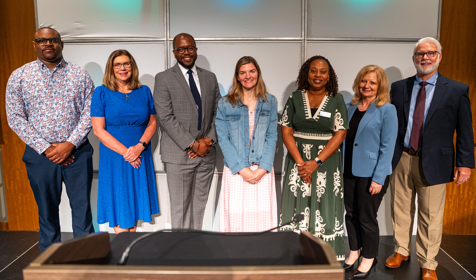 Meagan Brooks and Dr. Dixon with officials when named Teacher of the Year