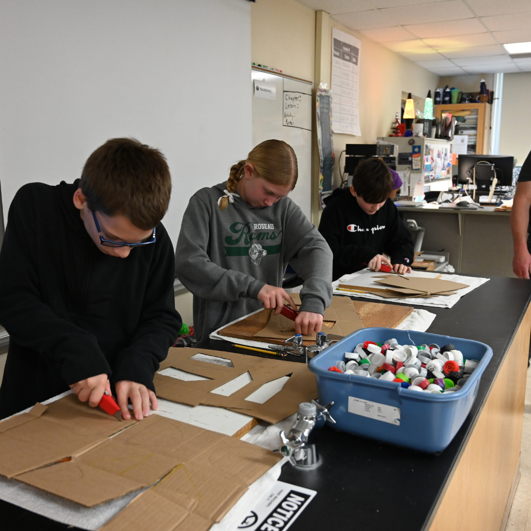 Students working together on project in class