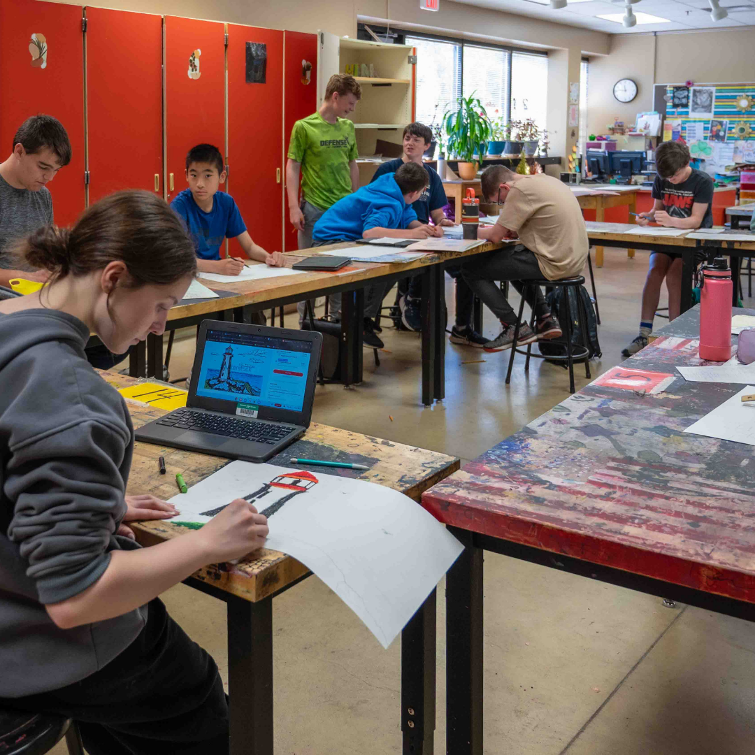 Students working on sketches in the art room