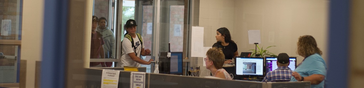 Century High School students walking into the main office at school.
