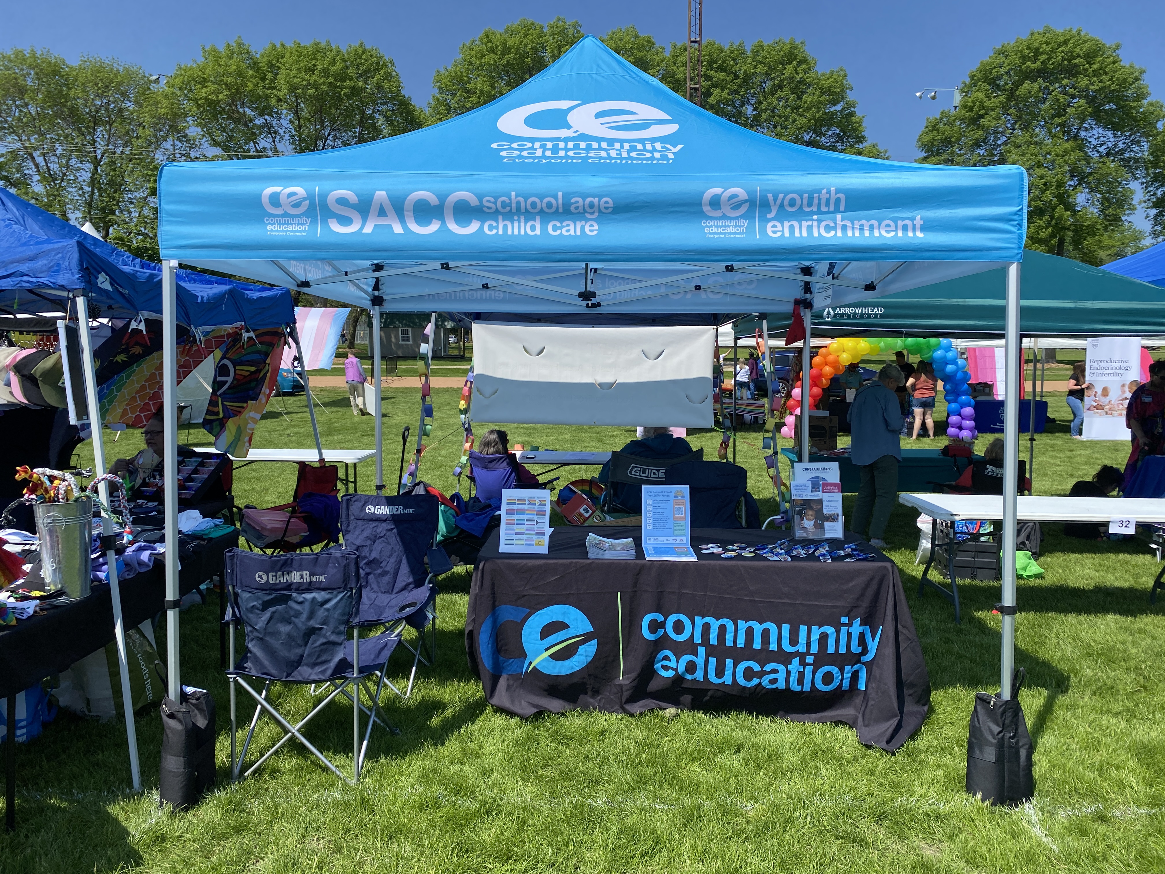 the community education pop-up tent at Rochester Pride