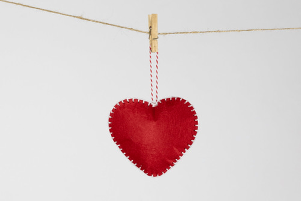 paper heart hanging from string