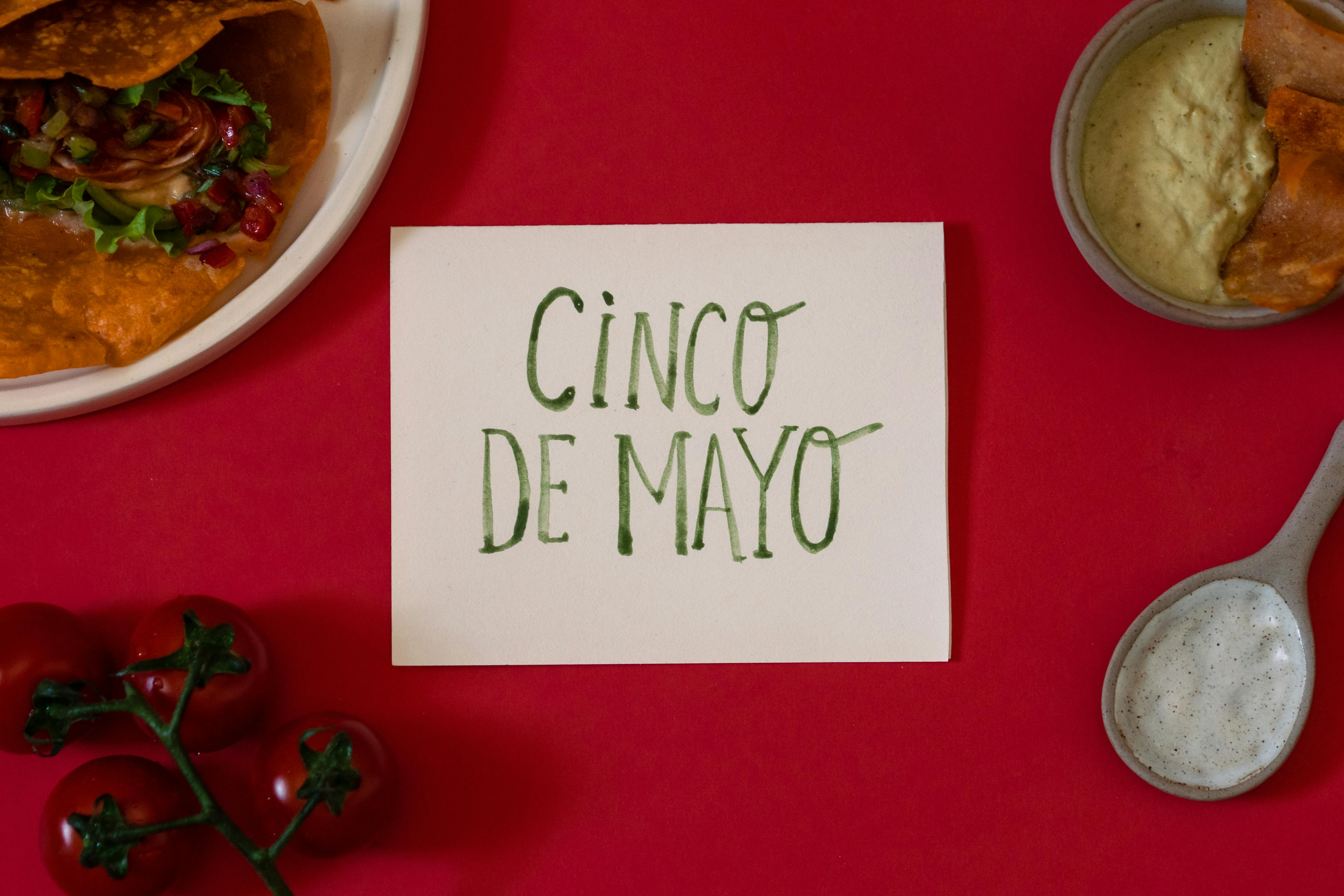 card saying Cinco de Mayo with some food
