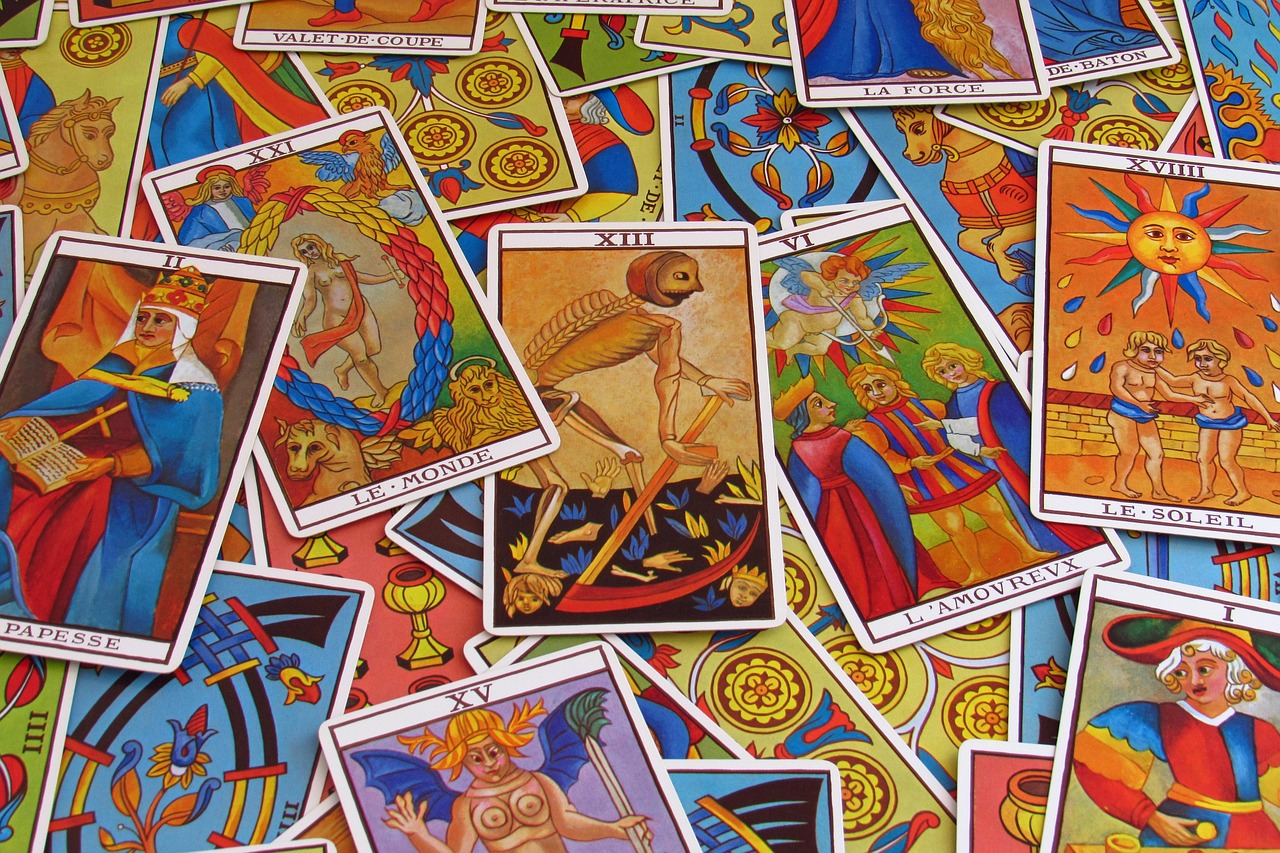 a pile of tarot cards