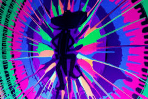 bicycle spin art creating a swirled shape of purple, neon green, and pink paints