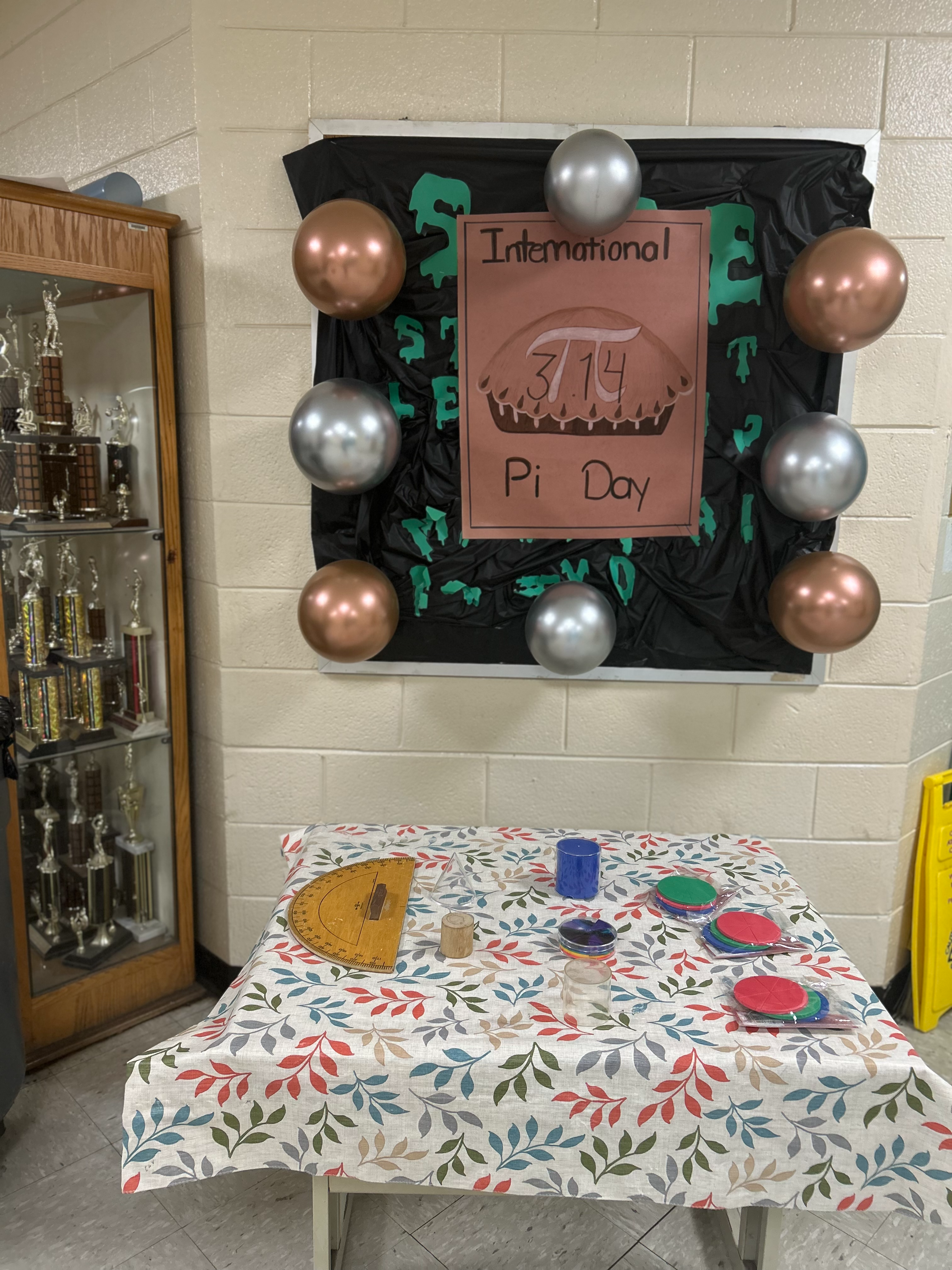 image of bulletin board and display of international Pi day