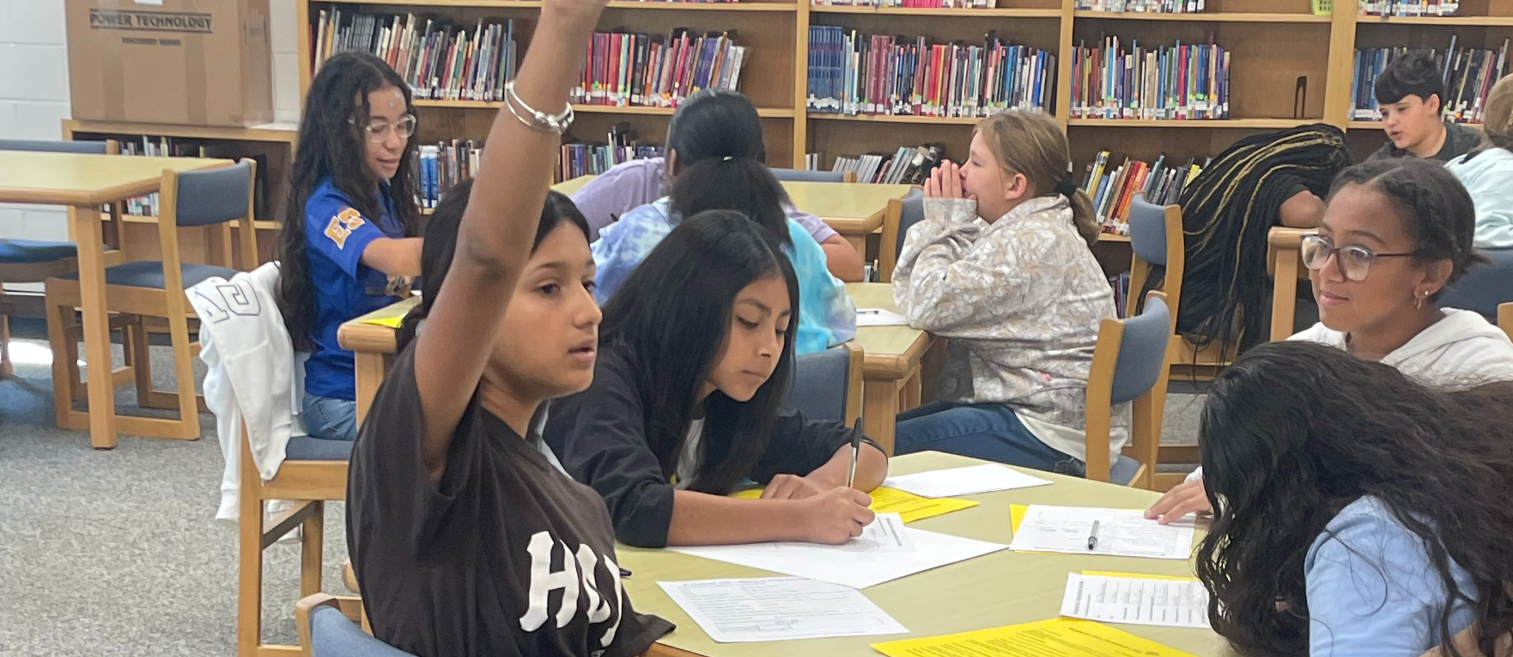 Ms. Carter meeting with the yearbook club