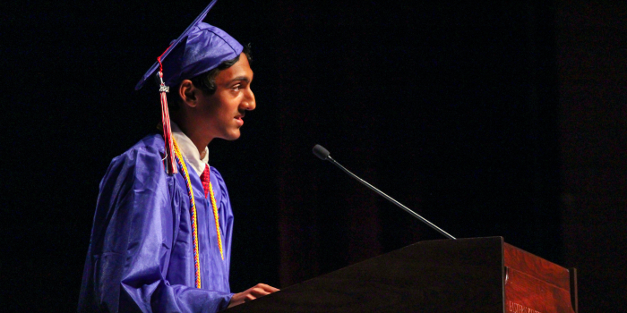 Student giving speech at graduation