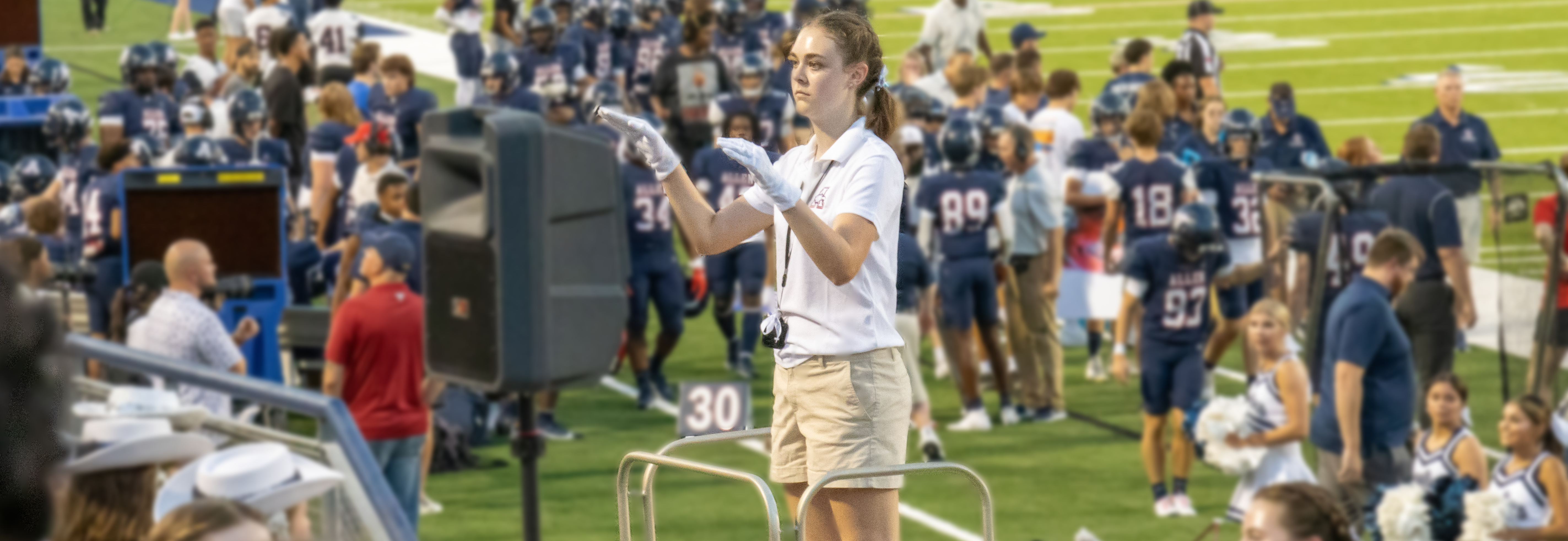 Drum Major leads band at DeSoto game