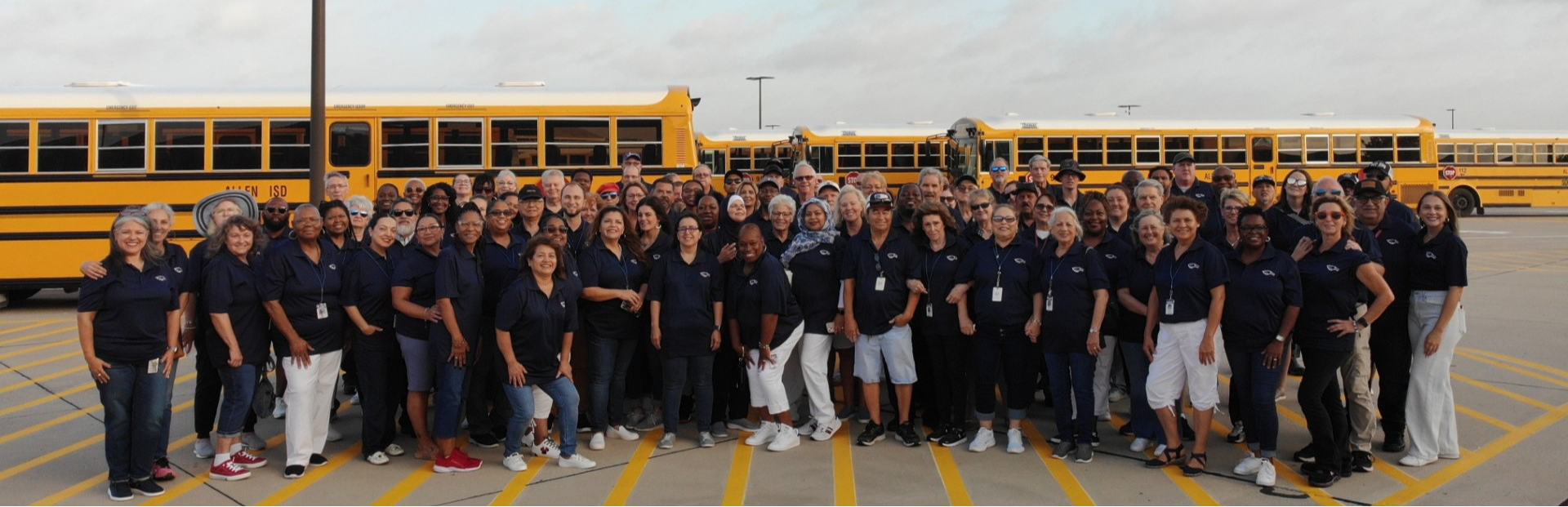 Transportation Department staff photo with buses