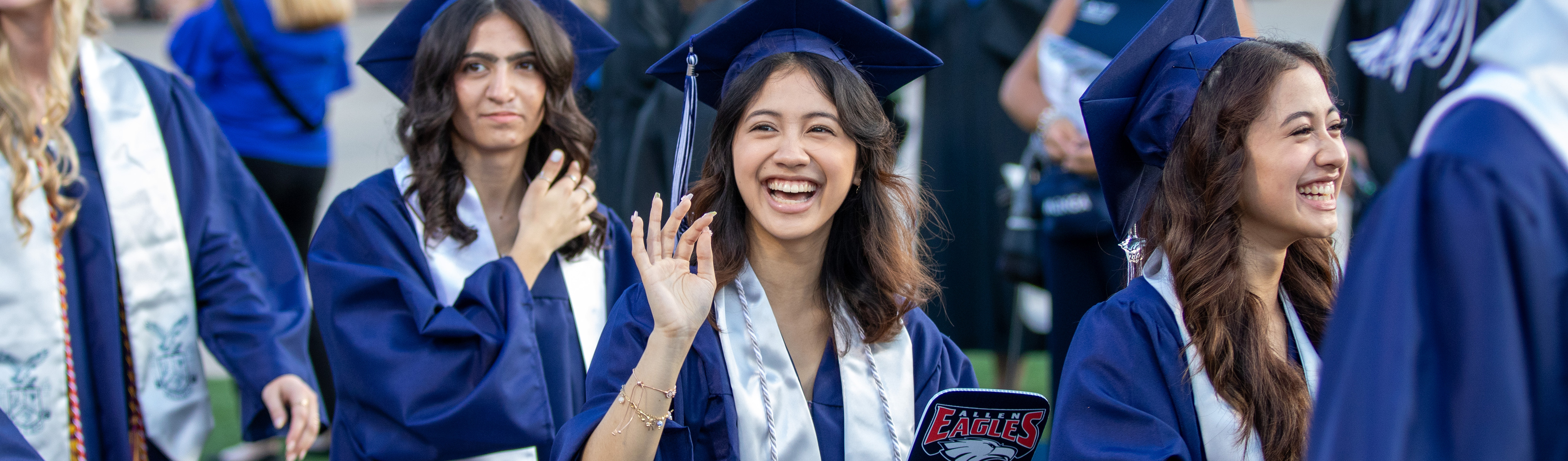 2025 Allen High School Graduate Waves Before Ceremony