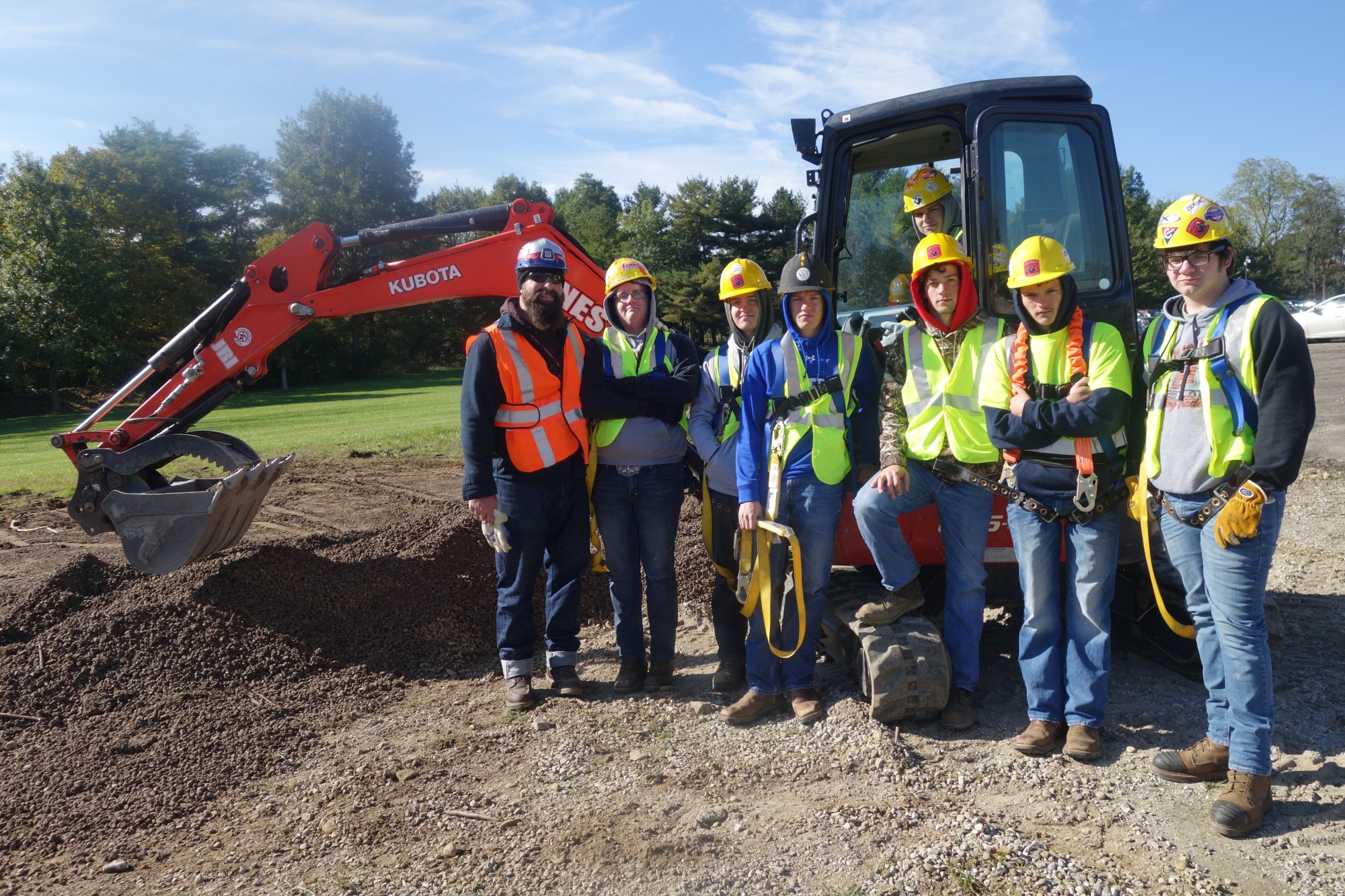 BT students practicing with backhoe