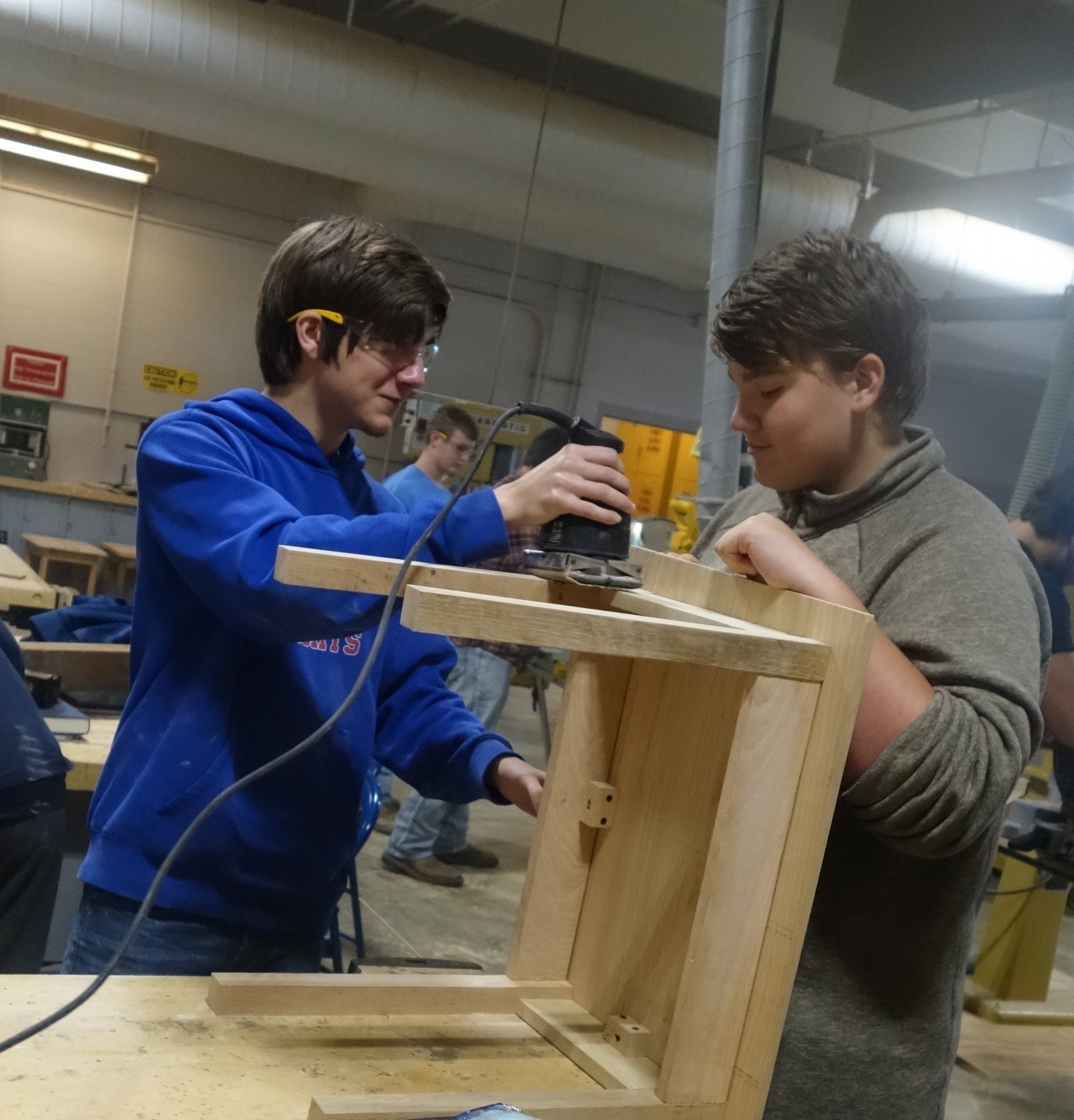 With their new instructor, Mr. Lacko, students spend the early weeks of MFG class working on their first project, an end table, while learning skills that can be employed throughout their lives.