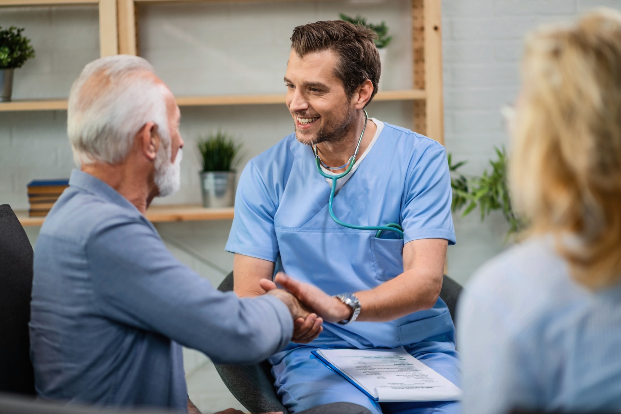 Man receiving help from a medical professional 