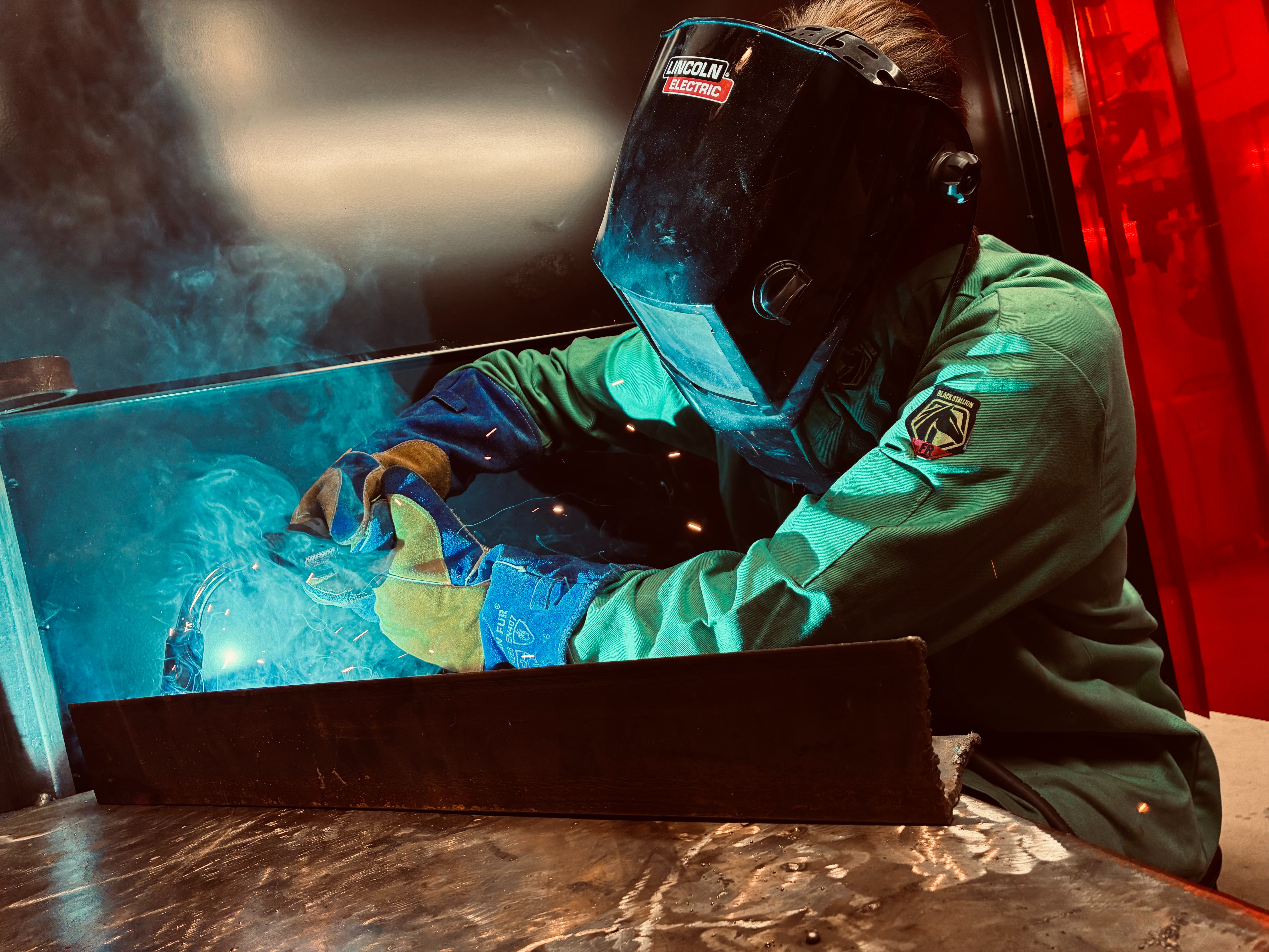 person welding