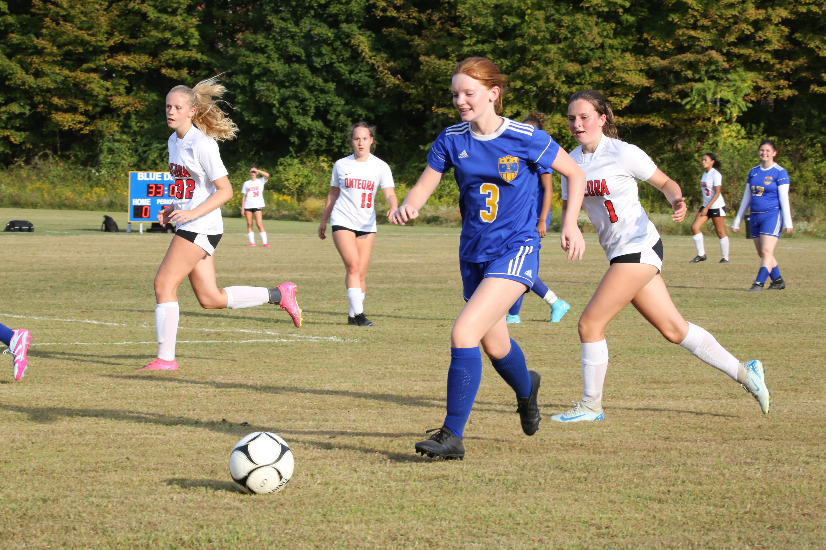 Student playing soccer