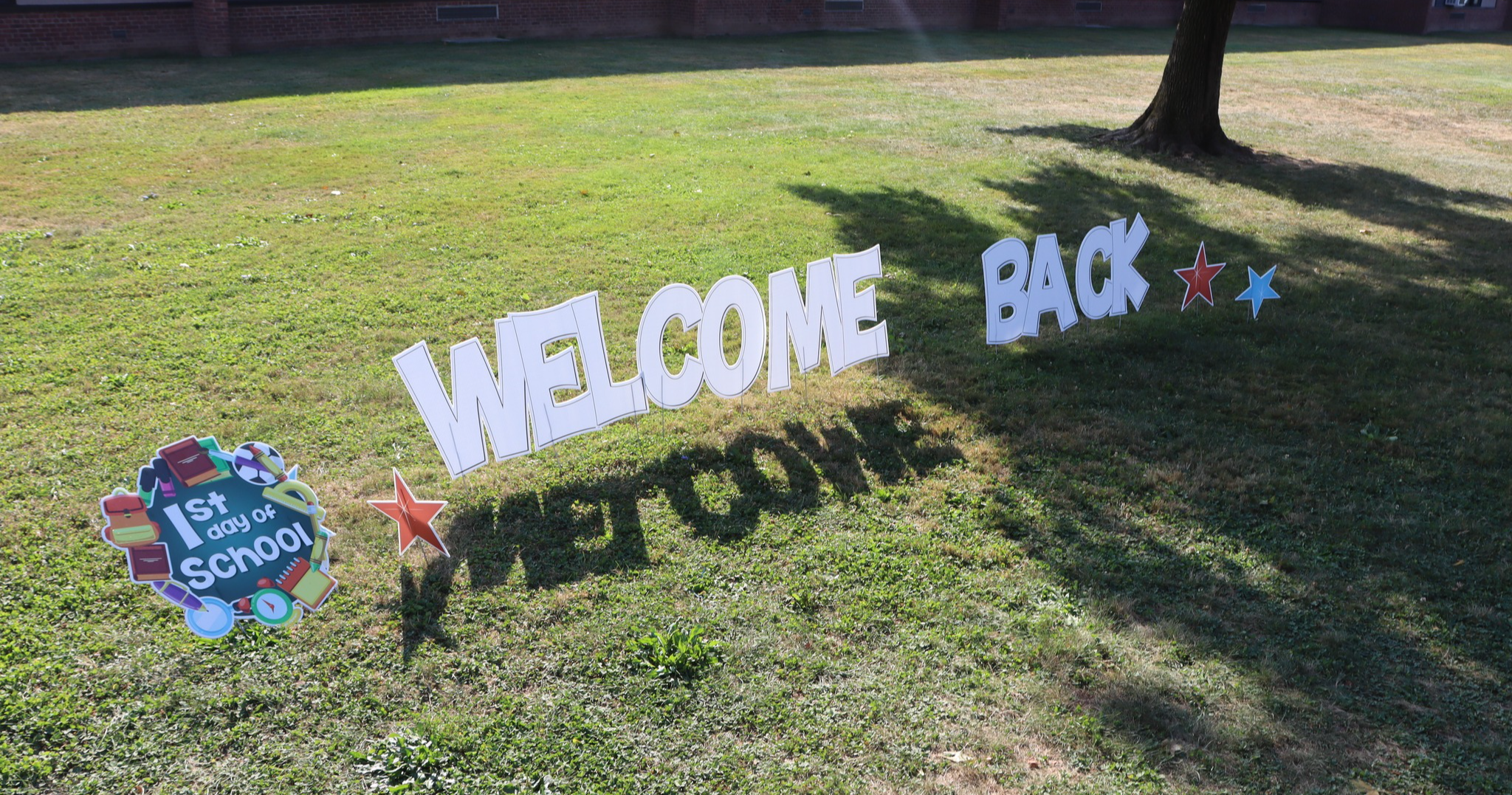 Welcome back lawn sign