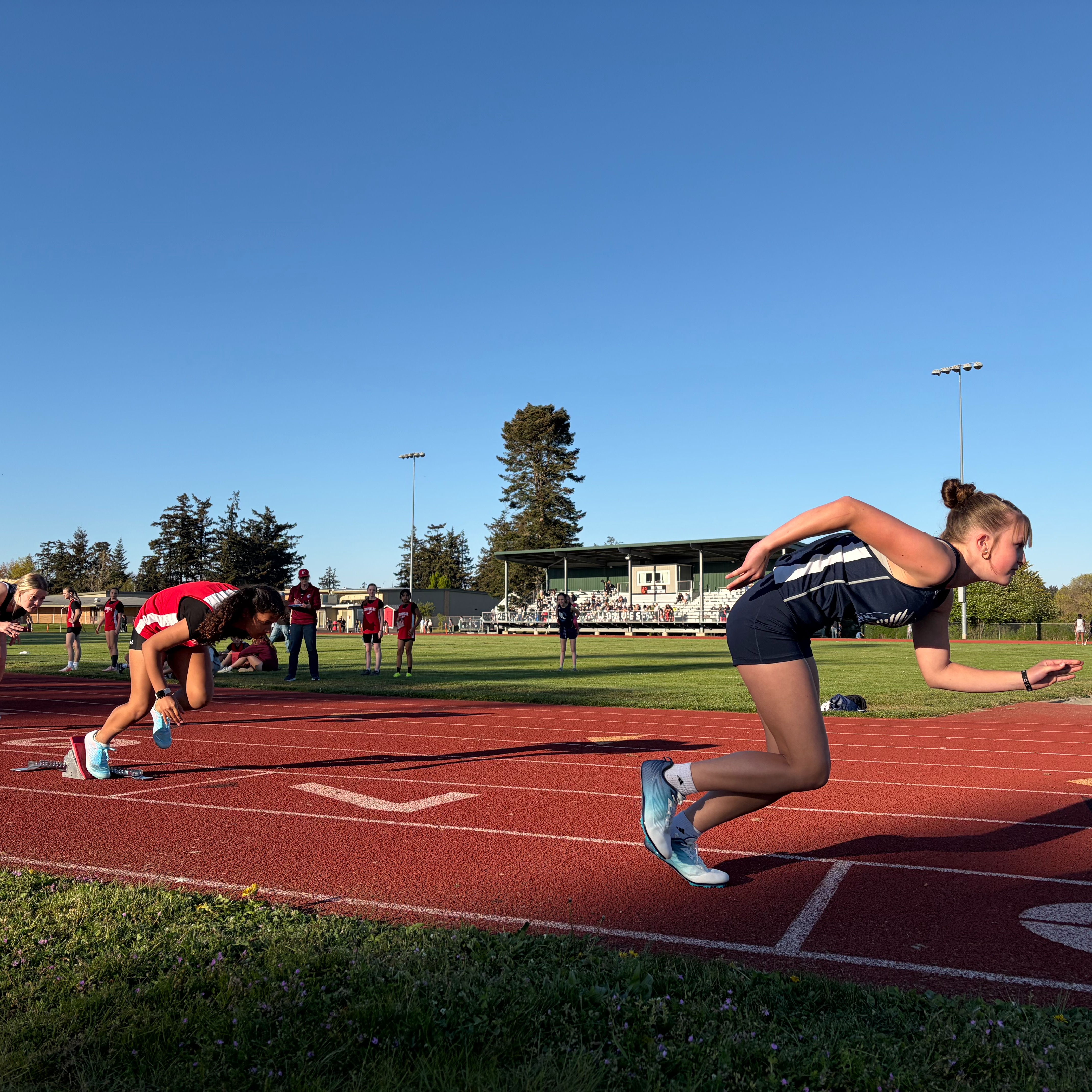 Runners on a track.