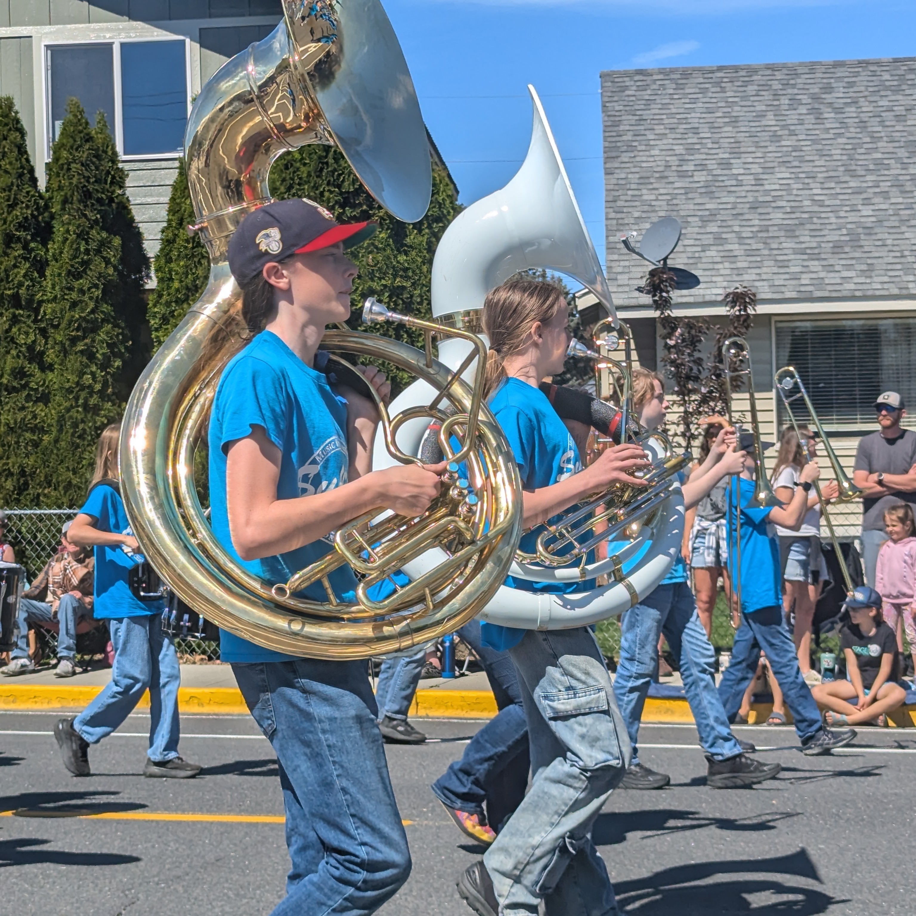 Marching band walking on the street.