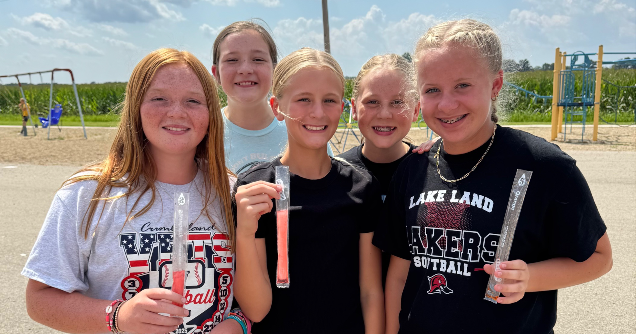 Students eating popsicles