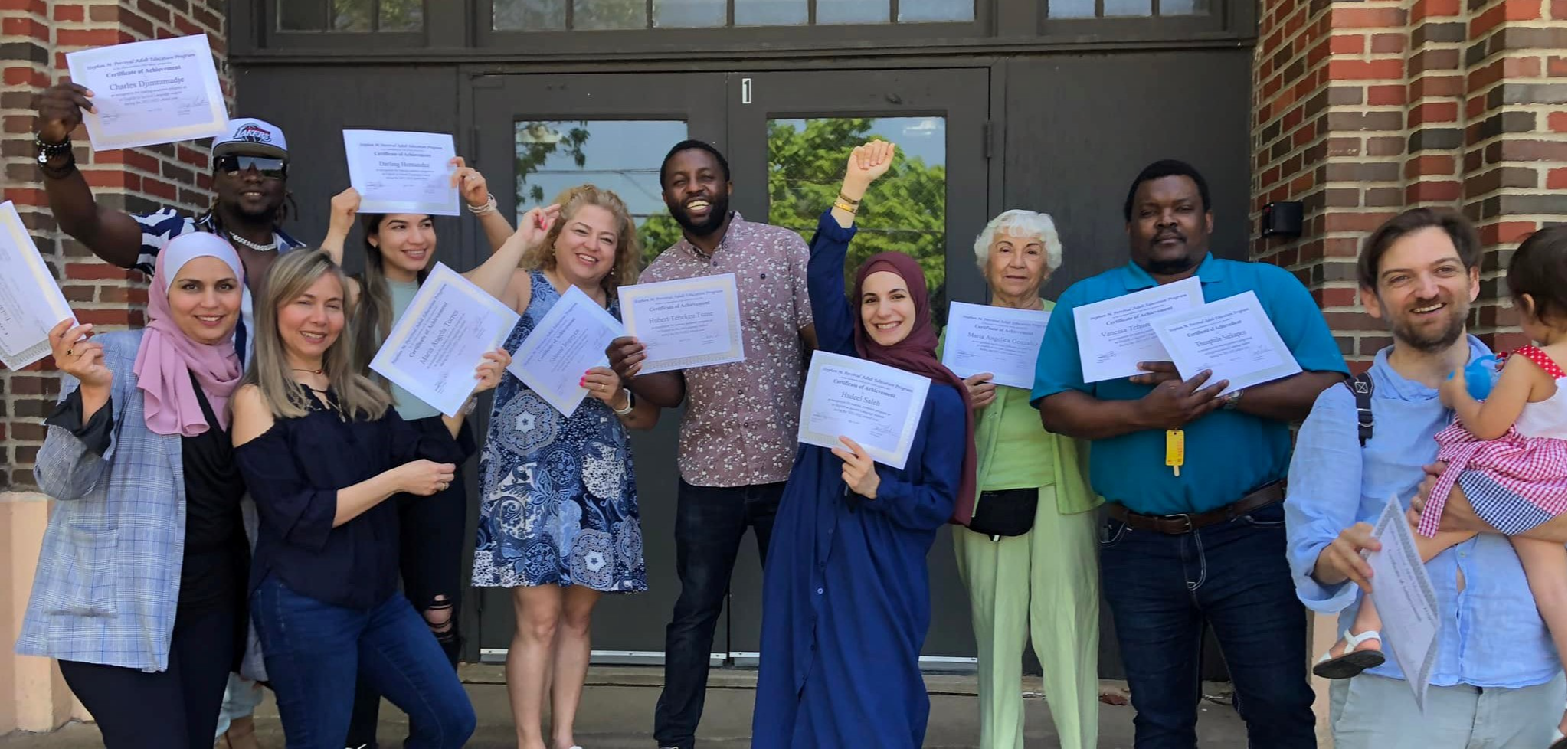 FPS Adult Education students with their certification certificates..