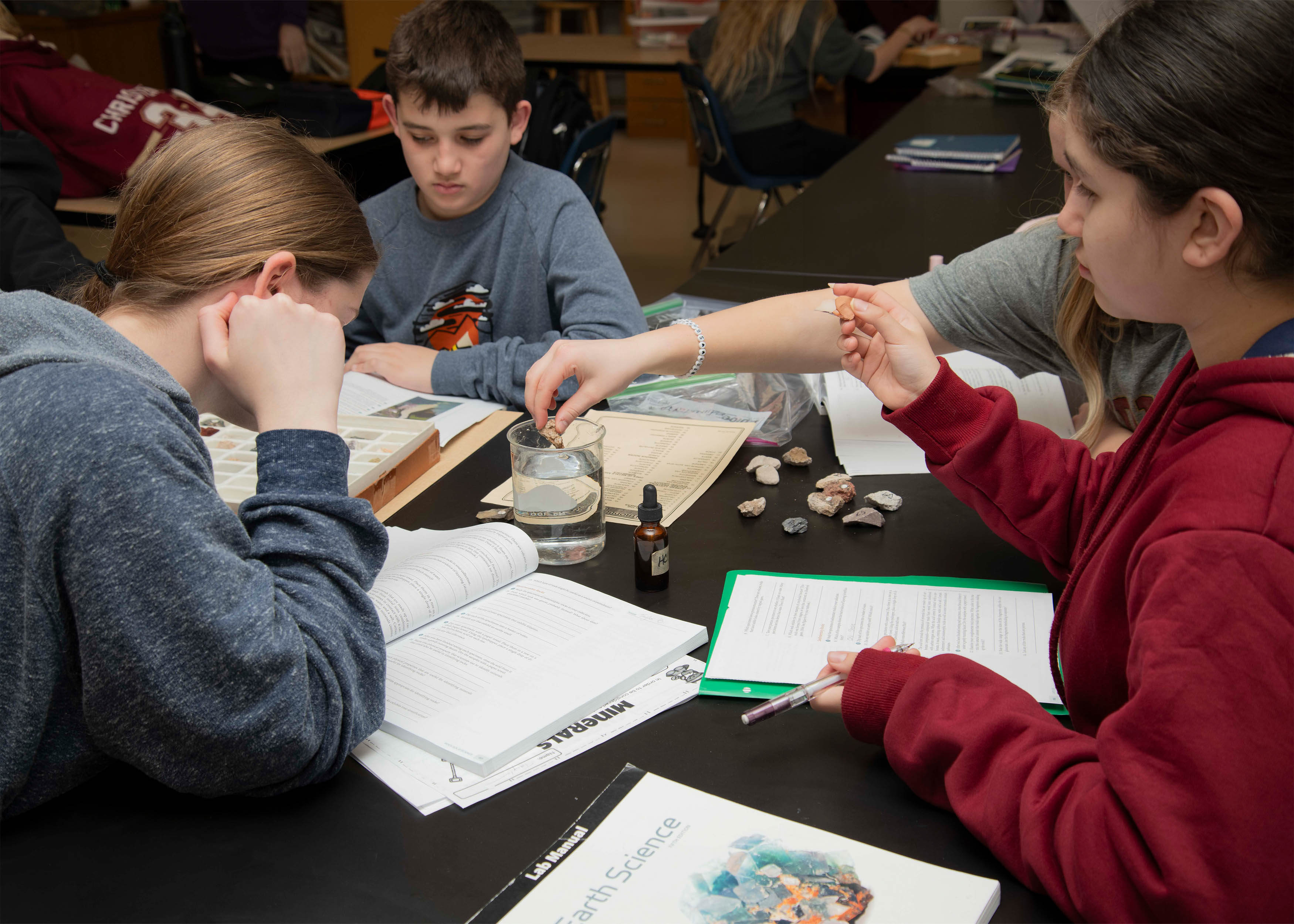 students doing science experiment