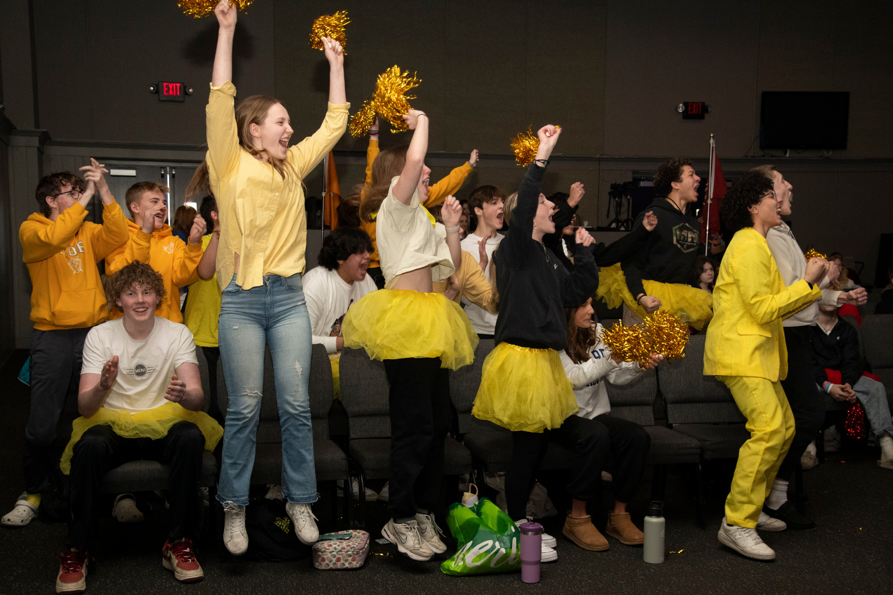 students cheering for their peers