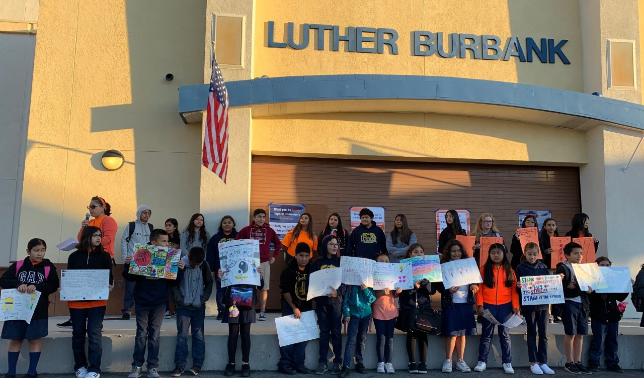 students holding signs