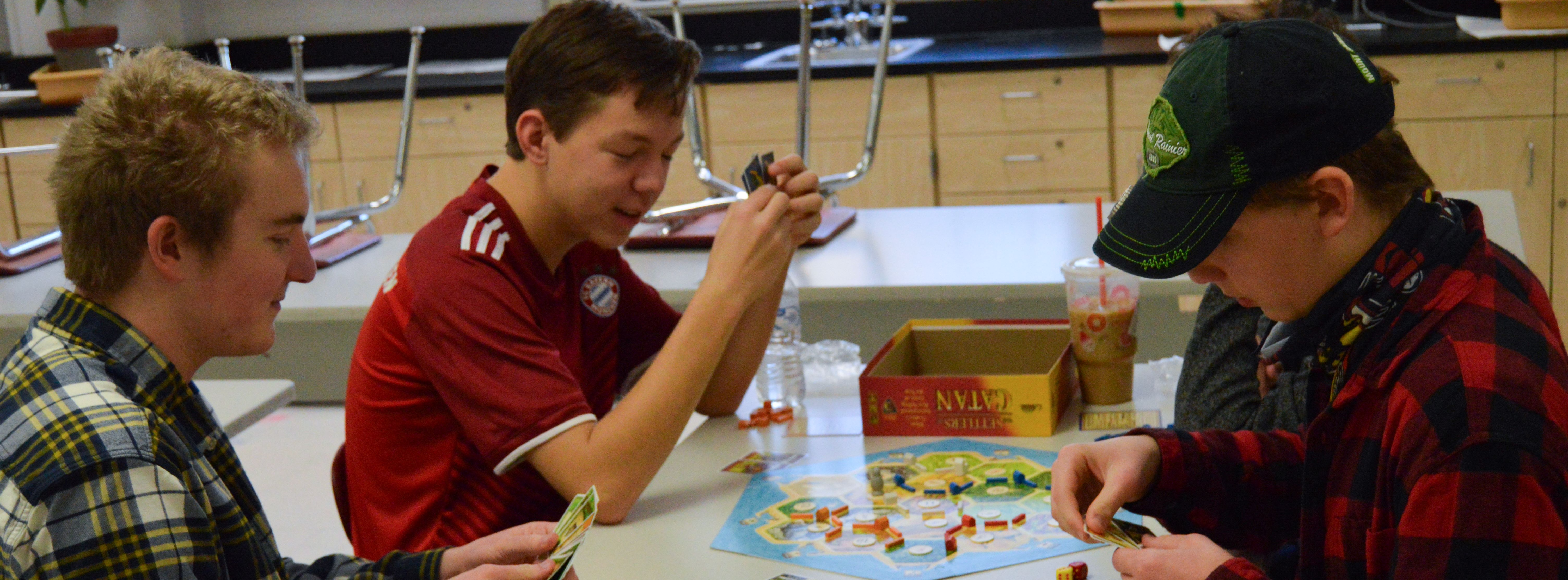 students playing a board game