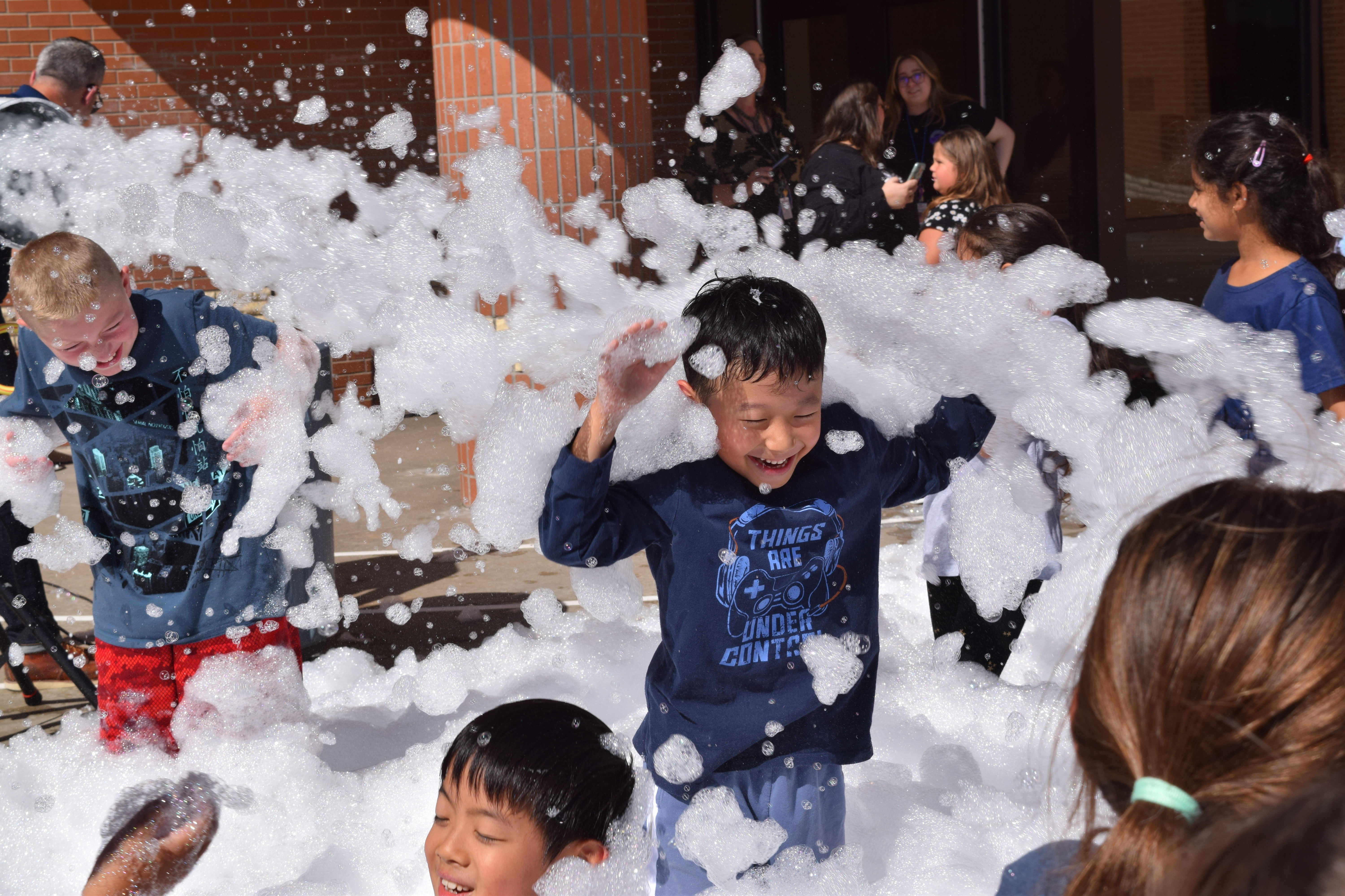student playing in foam