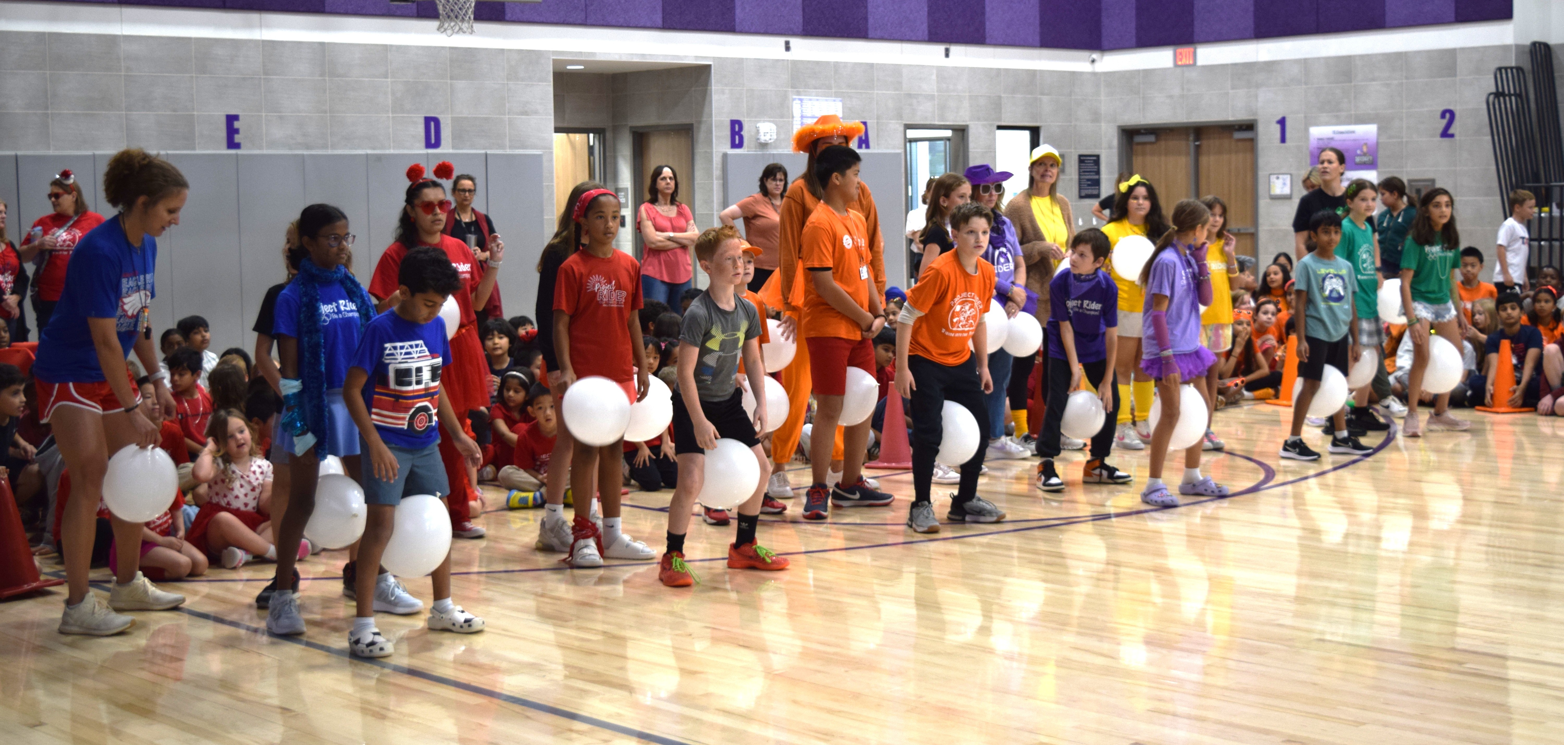 students playing a balloon game 