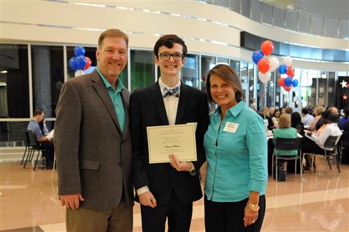 Merrick Family Scholarship - $1,000 Dawson Westurn with donors Charles and Laurie Merrick 