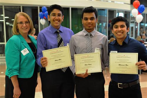 AISD Transportation Department Scholarship - $750-$2,500 each Soham Shah, Taaha Kamal, and Muhammad Alam with Foundation board member Susan Olinger (not pictured - recipient Tessa Kennedy and Mohammad Saleh)