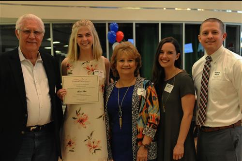 Allen Properties Scholarship in memory of Dr. Steve Burch - $1,000 Bailee Allen with donor Mike Williams of Allen Properties and Burch family members Troi Burch, Taryn Burch McPherson, and Stephen Burch 