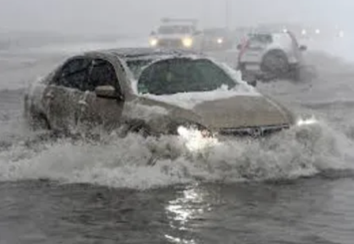 car in a flooding area
