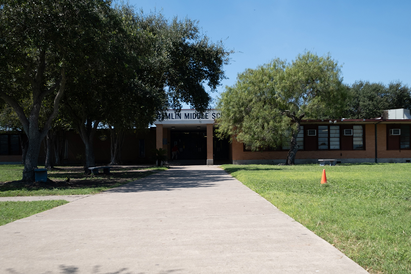 Old Middle school building with window ac units