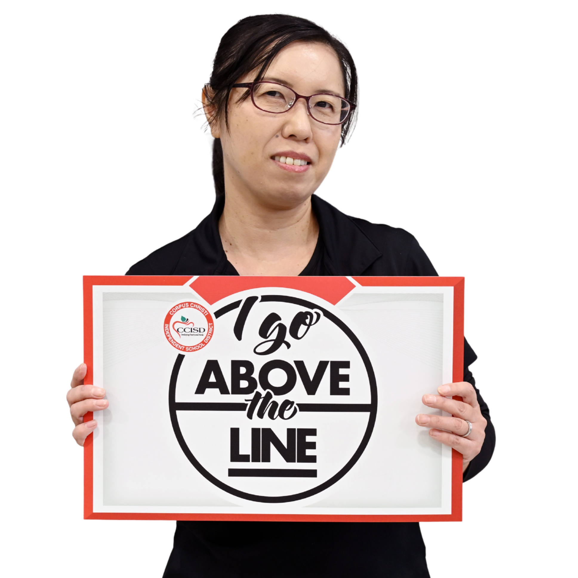 Person in glasses holds a large white sign with a red border. Text on sign reads "150 Above the Line".