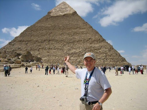 Dr. Hitt in front of an Egyptian pyramid.