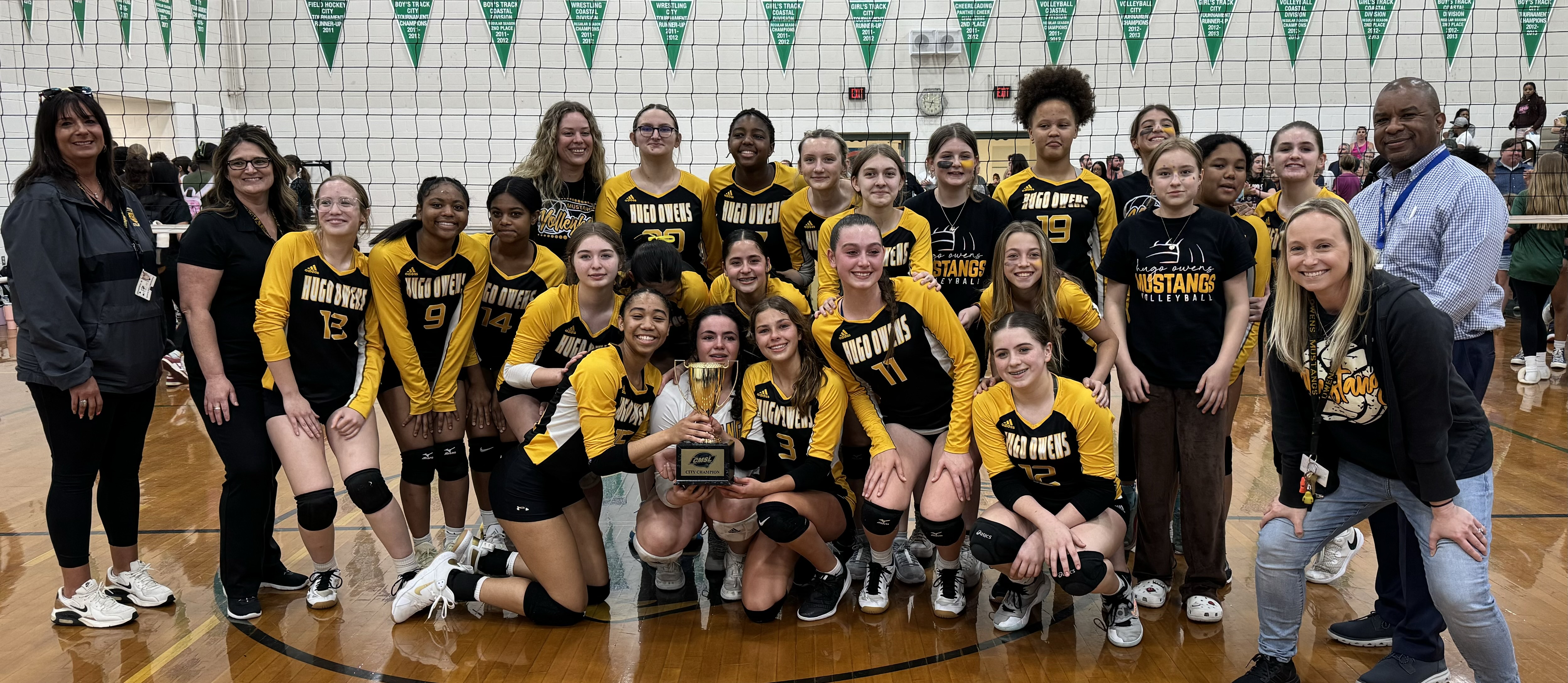2024 CMSL Volleyball Champs - Hugo Owens Middle poses with trophy