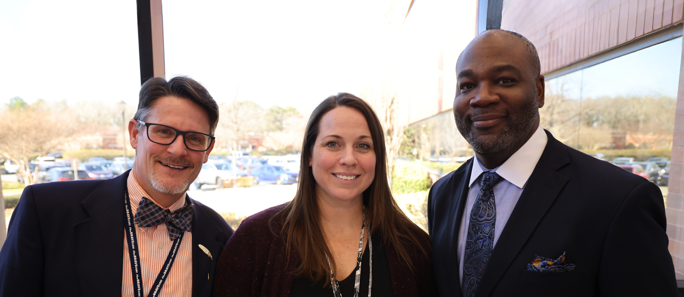 Three principals smiling. Chad Triolet, Brenna Stanley, and Quentin Hicks