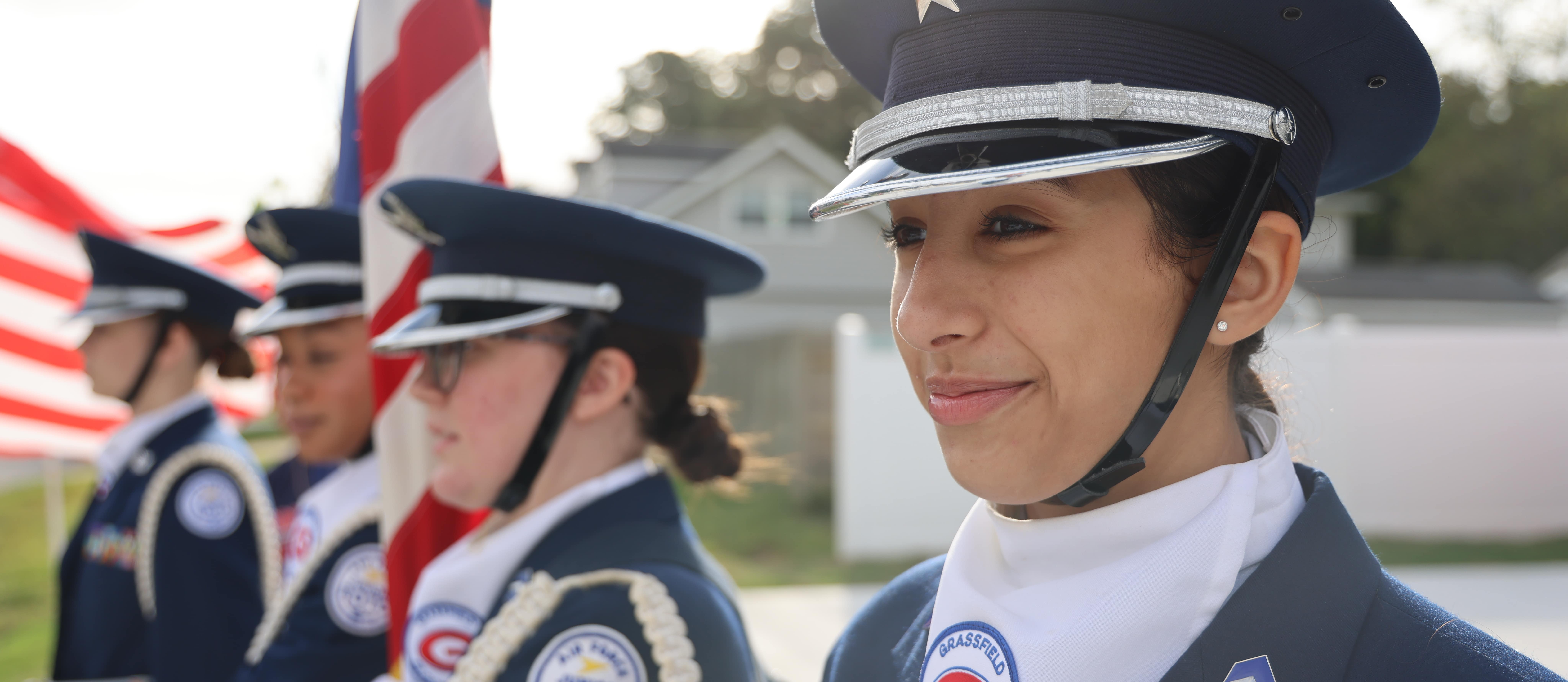ROTC students holding that colors