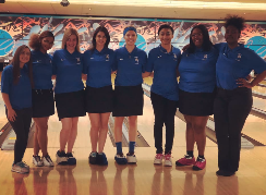 bowling team at bowling alley 