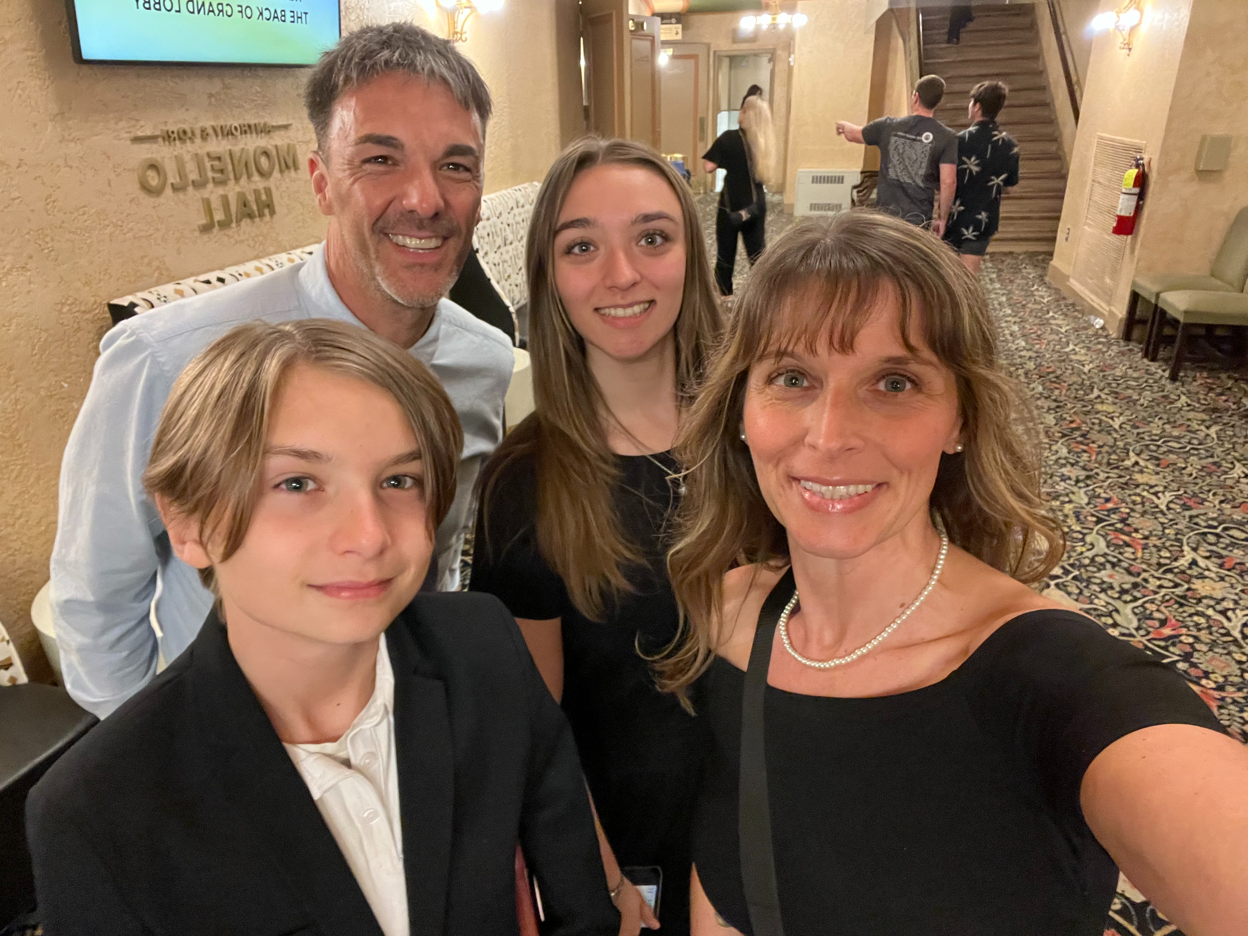 Mrs. Cowen at Disneyland with her family