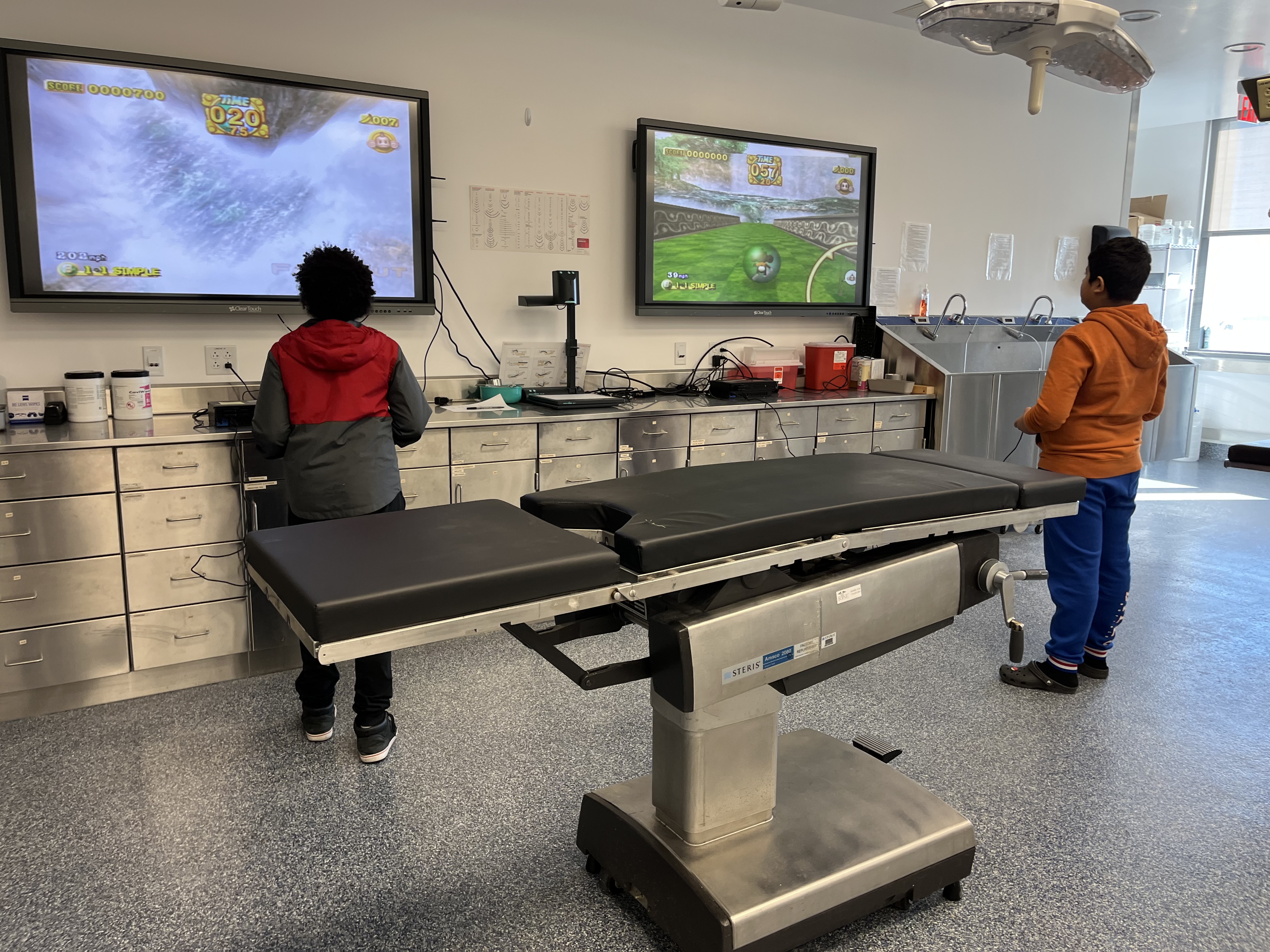 Students playing monkeyball to develop fine motor skills