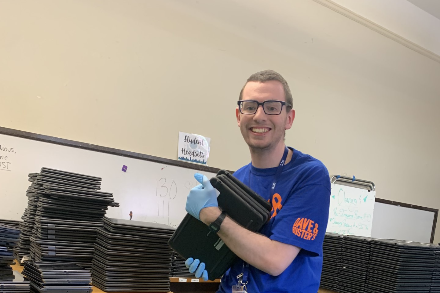 Student carrying laptops