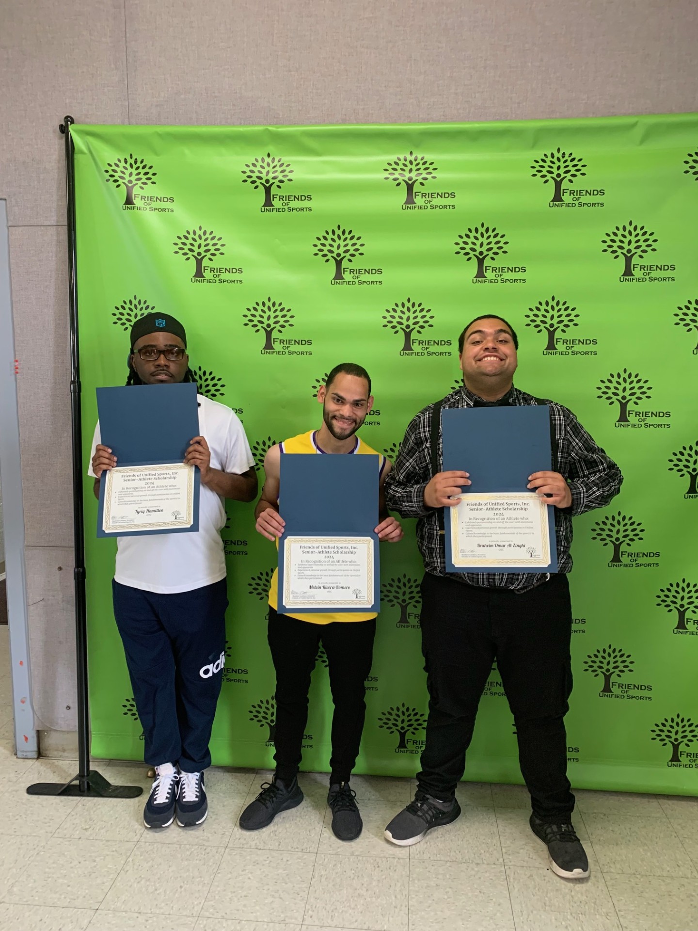 Students receiving scholarship award