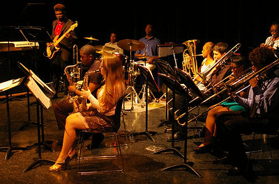 Students Performing on Stage Musical  Sax