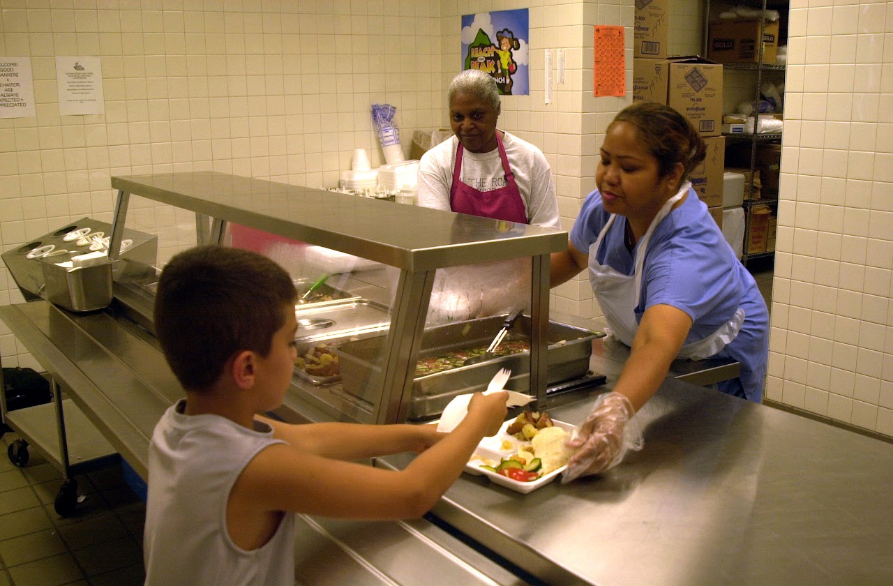 kid being served his food