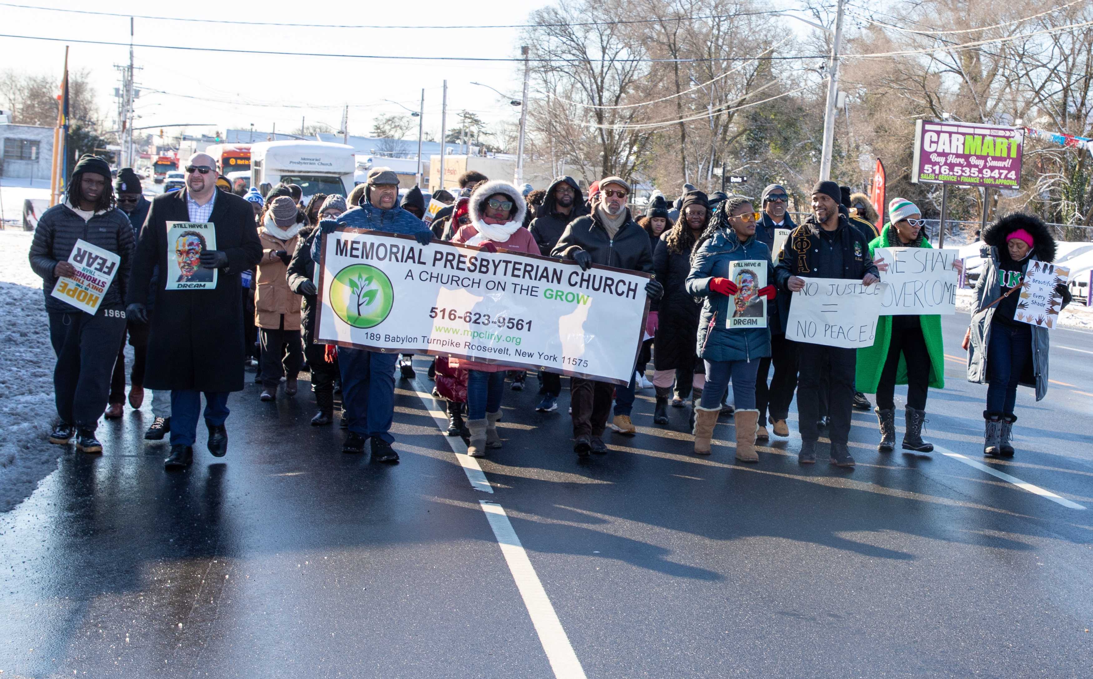 Marching with banner