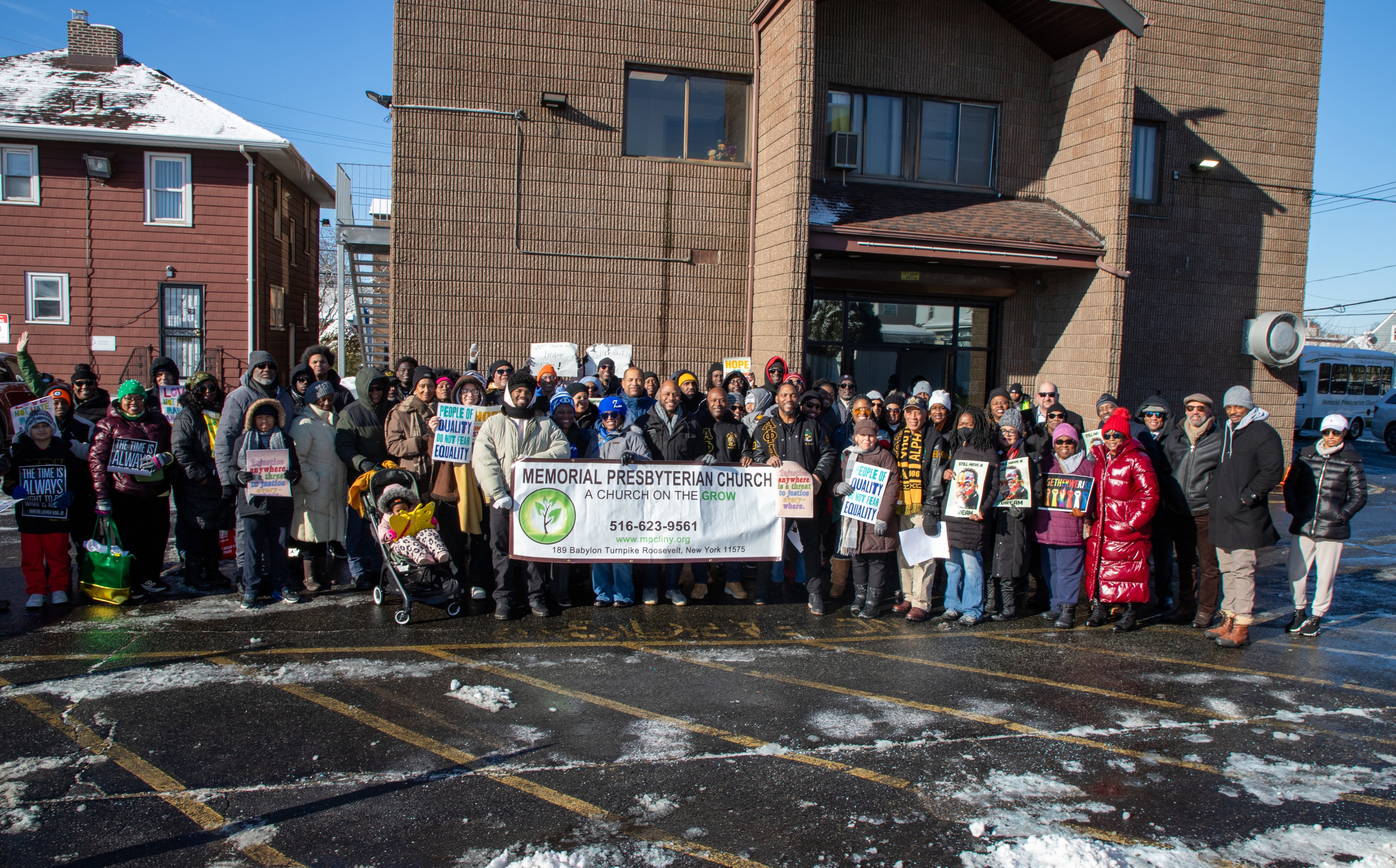 Group photo with banner